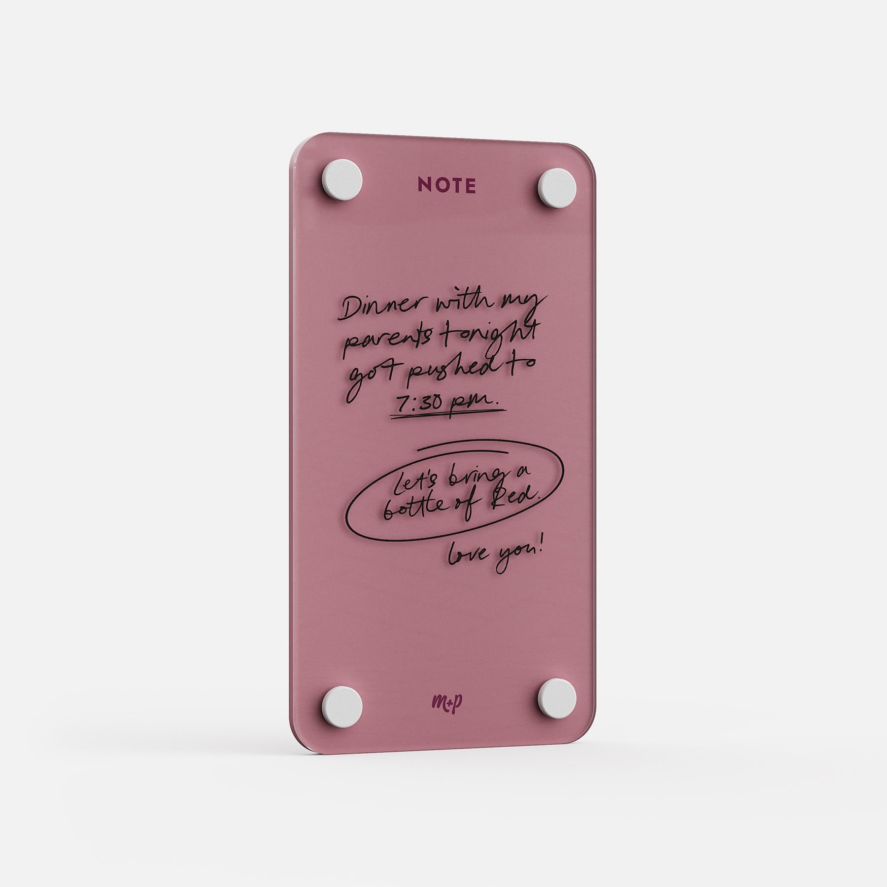 Angled view of a Plum tall magnetic acrylic note board with a handwritten note to a partner